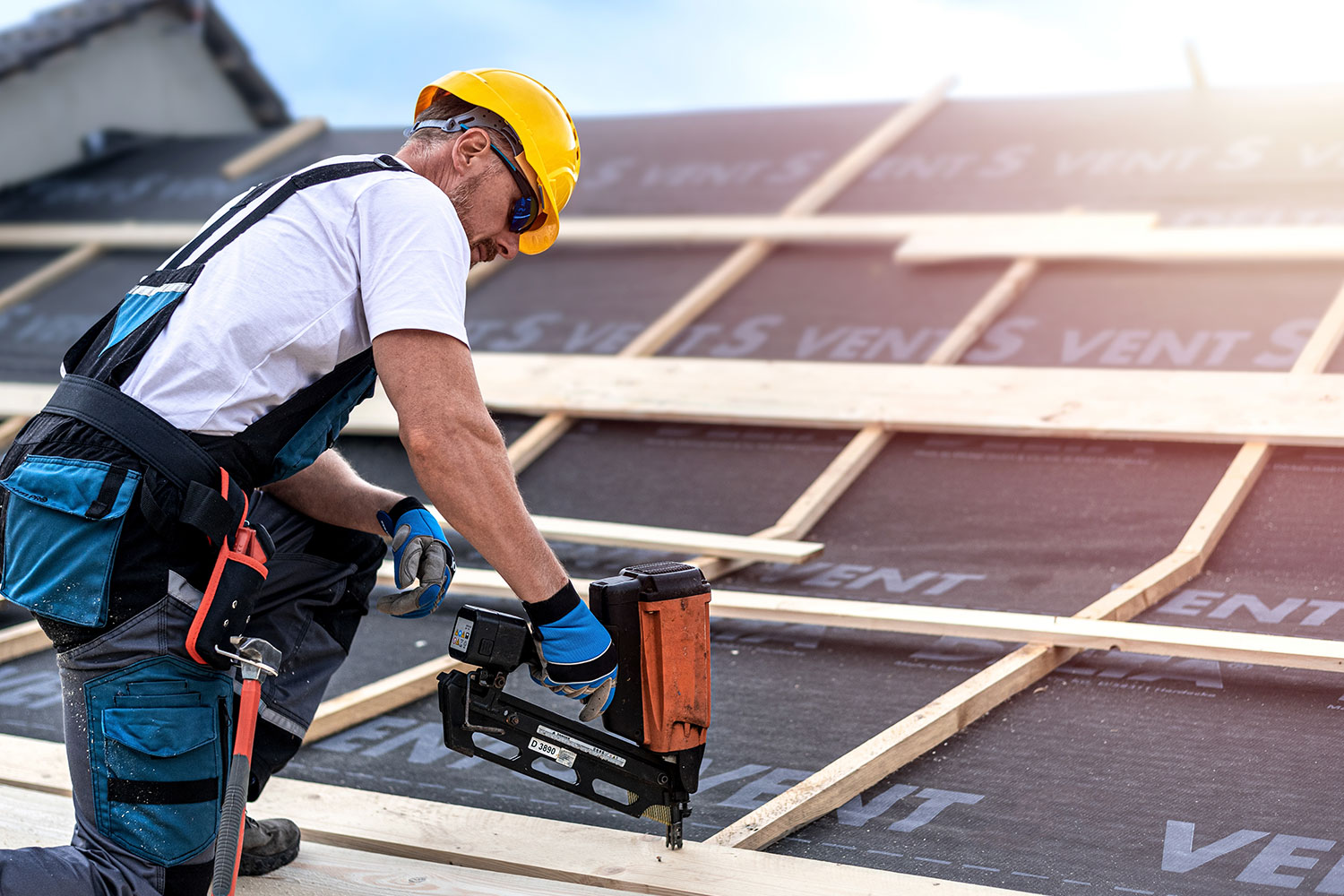 Raydiant Roofing Roofer Installing Roof Shingles