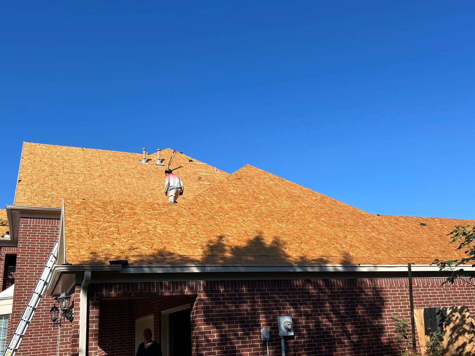 Raydiant Roofing Handymen Replacing Roof 
