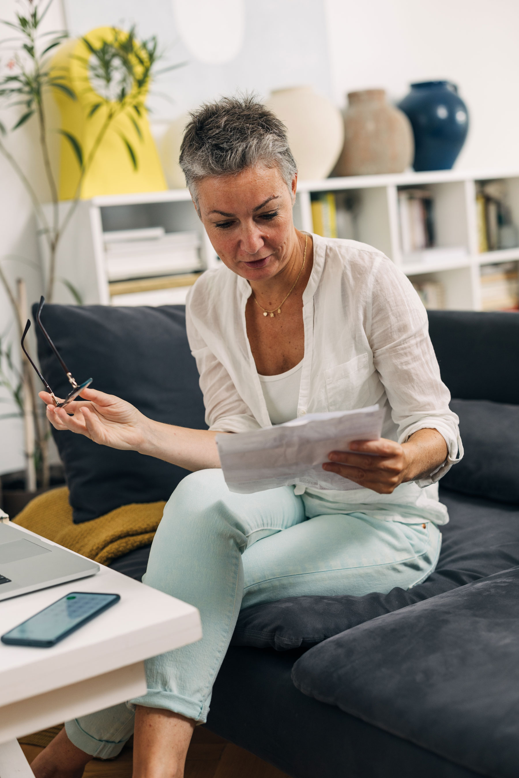 Woman Looking at her Electricity Bills