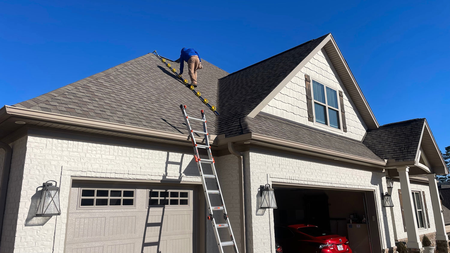 Raydiant Roofing Handymen Inspecting Roof 